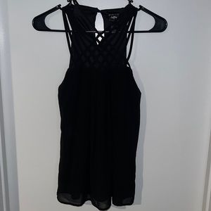 Black sleeveless high neck blouse